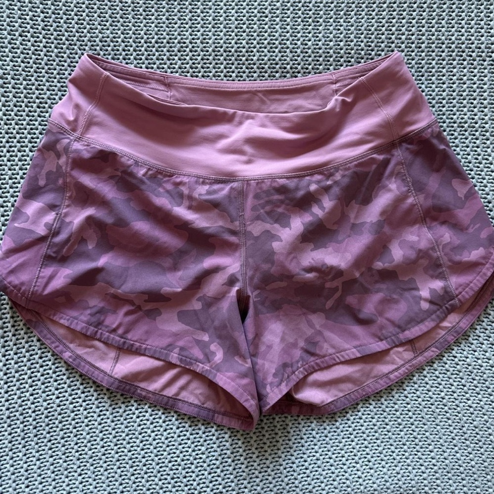 Lululemon shorts 
Size 6 Long 
Speed up 2.5 inseam (I think)
Purple/pink camo